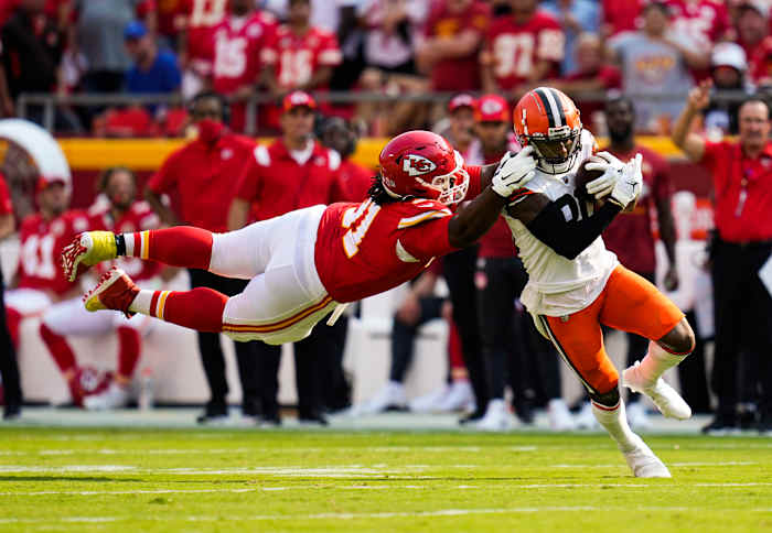Kansas City Chiefs nose tackle Derrick Nnadi (91) is called for a facemask penalty on Cleveland Browns wide receiver Jarvis Landry (80) during the first half at GEHA Field at Arrowhead Stadium.